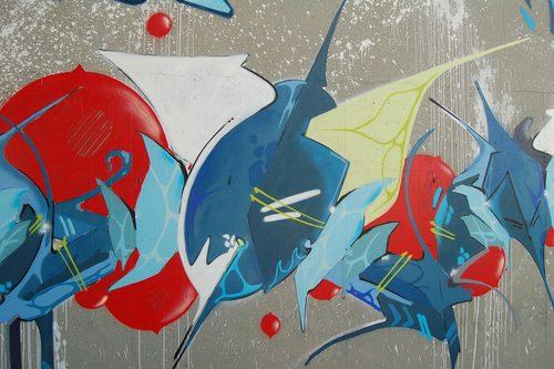Graffiti on gray wall (Unsplash) — Spray Paint Art